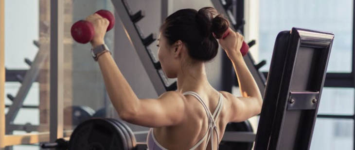 Experienced lifters working through a barbell session